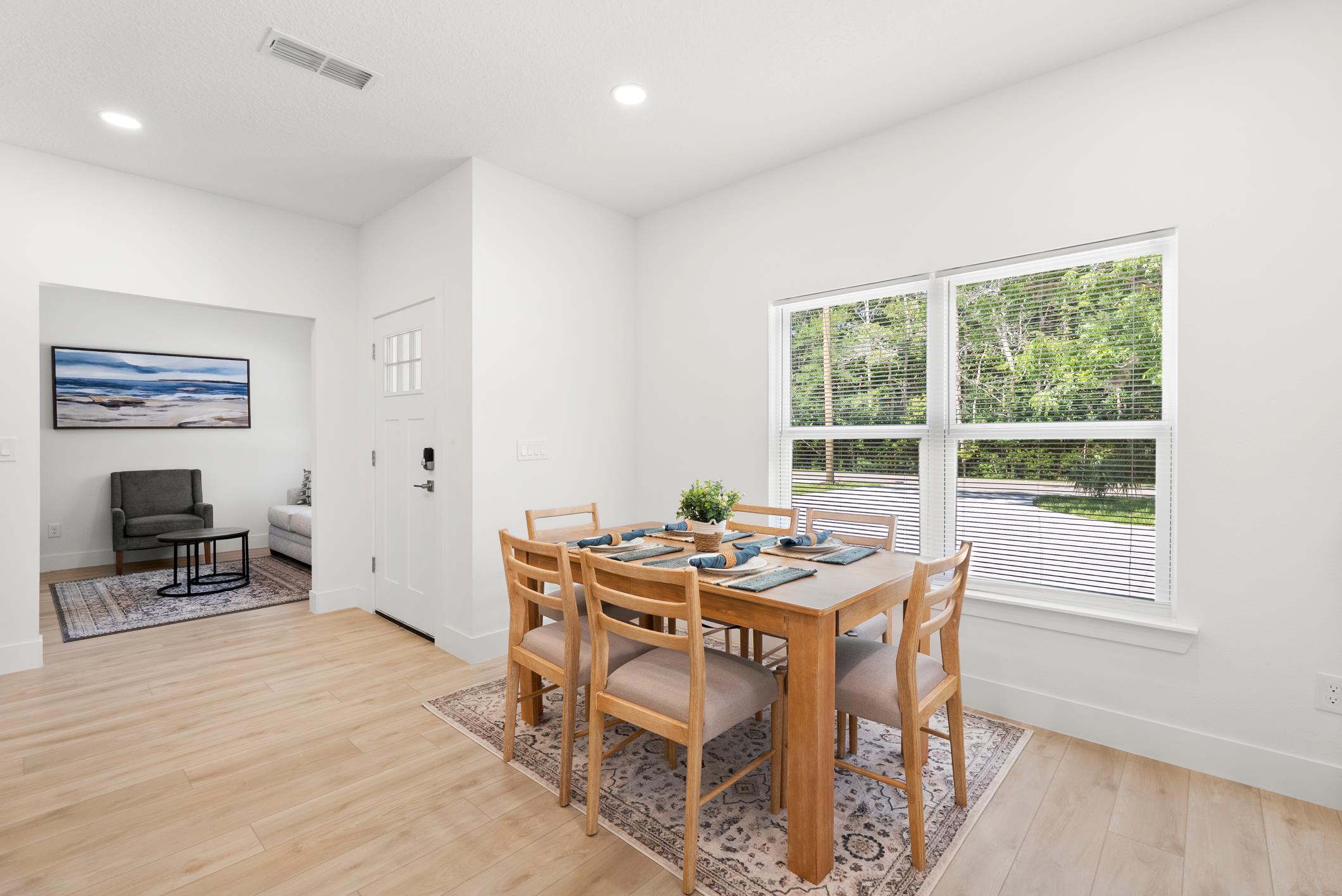 Entry with dining table and sitting nook